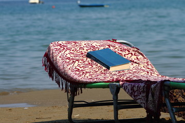Book on the sunbed,Tuscany