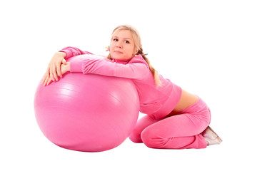 Woman with Exercise ball isolated on white