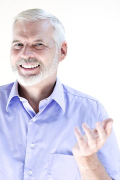 Senior man portrait saluting cheerful