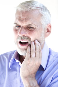 Senior man portrait toothache pain