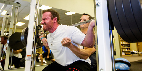 Fototapeta na wymiar Weightlifter in gym