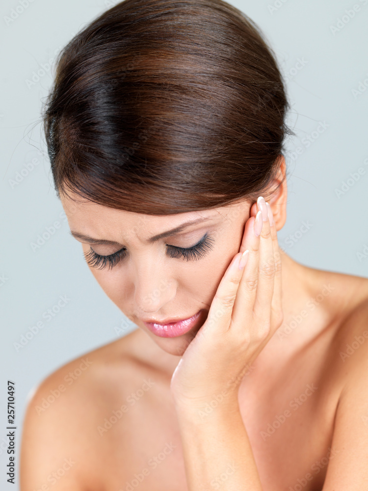 Wall mural portrait of beautiful woman, she has tootache