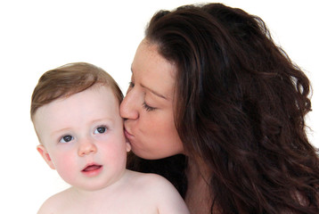 Mother kissing her baby boy