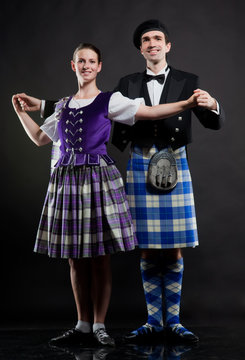 The pair dancing the Scottish dance in a kilt