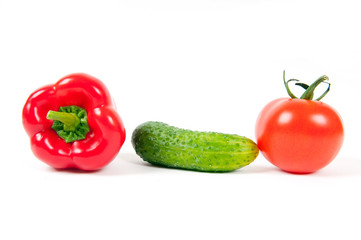 red pepper, tomato and green cucumber isolated