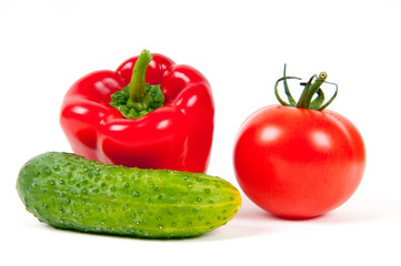 red pepper, tomato and green cucumber isolated