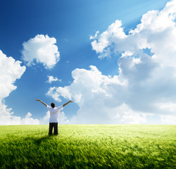 happy young man rest on wheat field