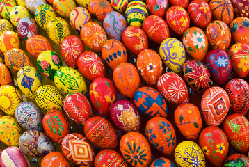 Fototapeta na wymiar Yellow, red, orange painted Easter Eggs