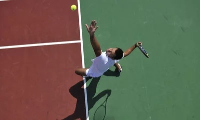 Foto op Plexiglas young man play tennis outdoor © .shock