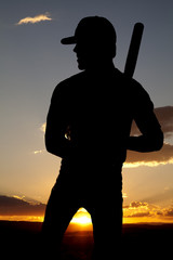 Silhouette baseball standing sunset