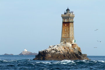 lighthouses in ocean - obrazy, fototapety, plakaty