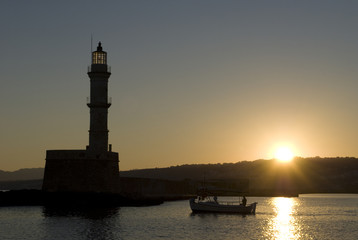 Sunrise at the old harbour of Chania in Crete