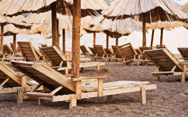 Many chairs and umbrella on the beach
