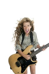 Fototapeta premium little blond girl playing guitar