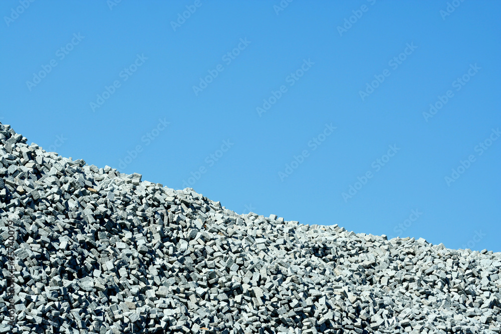 Canvas Prints granite stone pile with blue sky