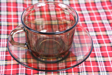 Empty glass tea cup isolated