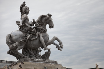 Statue of Louis XXIV in the court of Louvre museum, Paris