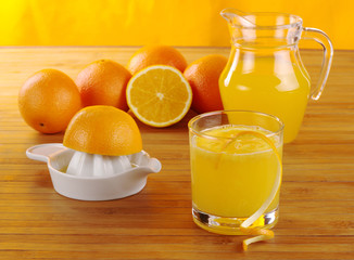 Fresh orange juice with orange juice squeezer (Selective Focus)