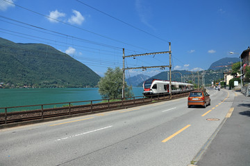 Road and train along Geneve Lake, Switzerland, Europe.