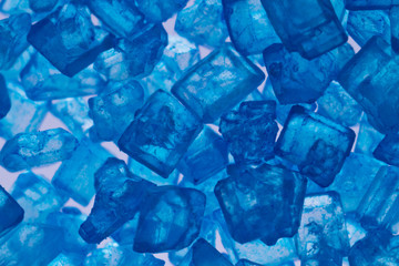 Extreme closeup of blue sugar crystals