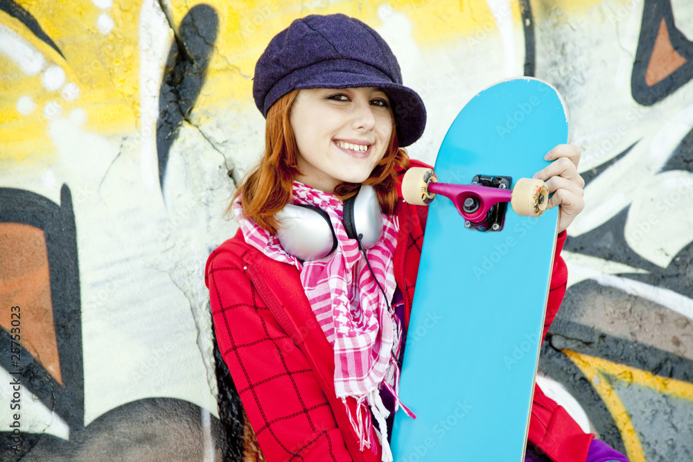 Sticker closeup portrait of a happy young girl with skateboard and graff