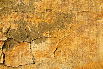 The texture of old cracked plaster.