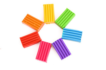 Childen bright multicoloured plasticine  isolated on white