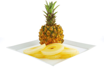 raw pineapple and slices