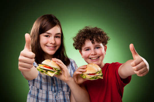 Kids Eating Big Sandwich