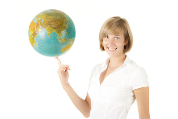 Woman holding globe on a finger