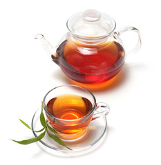 cup with tea and teapot
