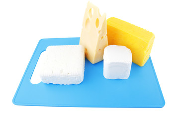 cheeses on blue plate