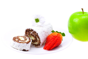 sweet rolls and strawberry on a saucer flower and apple isolated