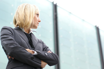 A young blond business woman in formal clothes