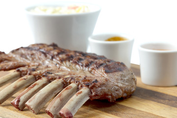 meat and sauce on a cutting bard