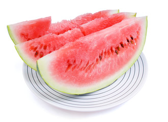 Three portions of a water-melon on a white plate