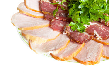 Appetizer of the two types of meat, decorated with parsley, isol