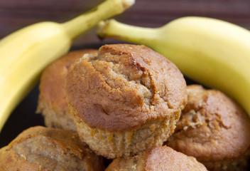 banana muffins on a black plate