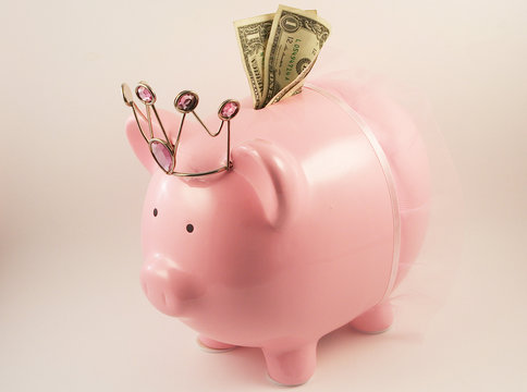 pink piggy bank with crown