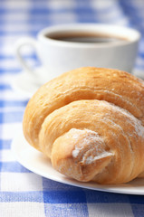 Croissant and black coffee