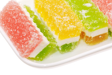 Fruit candy slices on the white