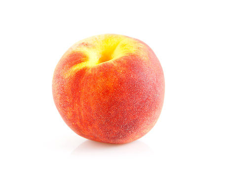 one fresh peach over white background