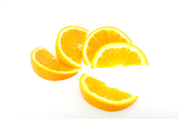 orange slices fanned out isolated on white