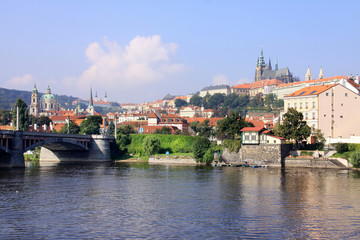Prague with gothic Castle above River Vltava, Czech Republic