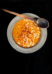 White bean stew, isolated on black . Above shot