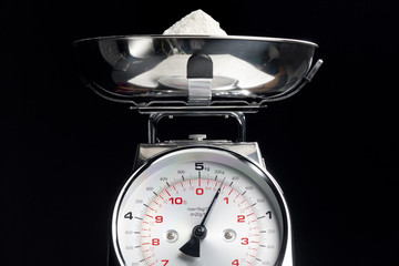 kitchen scales with flour