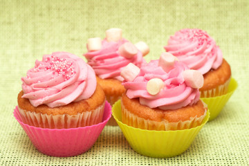 Vanilla cupcakes with strawberry icing