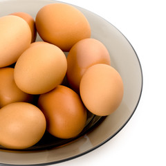 brown eggs in the plate