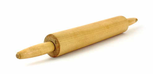 An old wood rolling pin on a white background