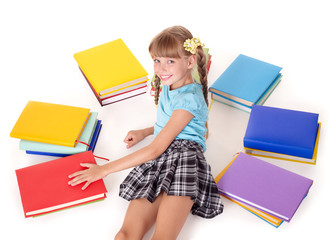 Child with open book lying on floor. Isolated.